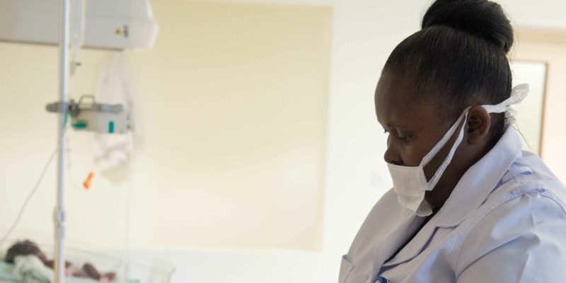 Maternity. Nurse Taking Care Of A Baby.