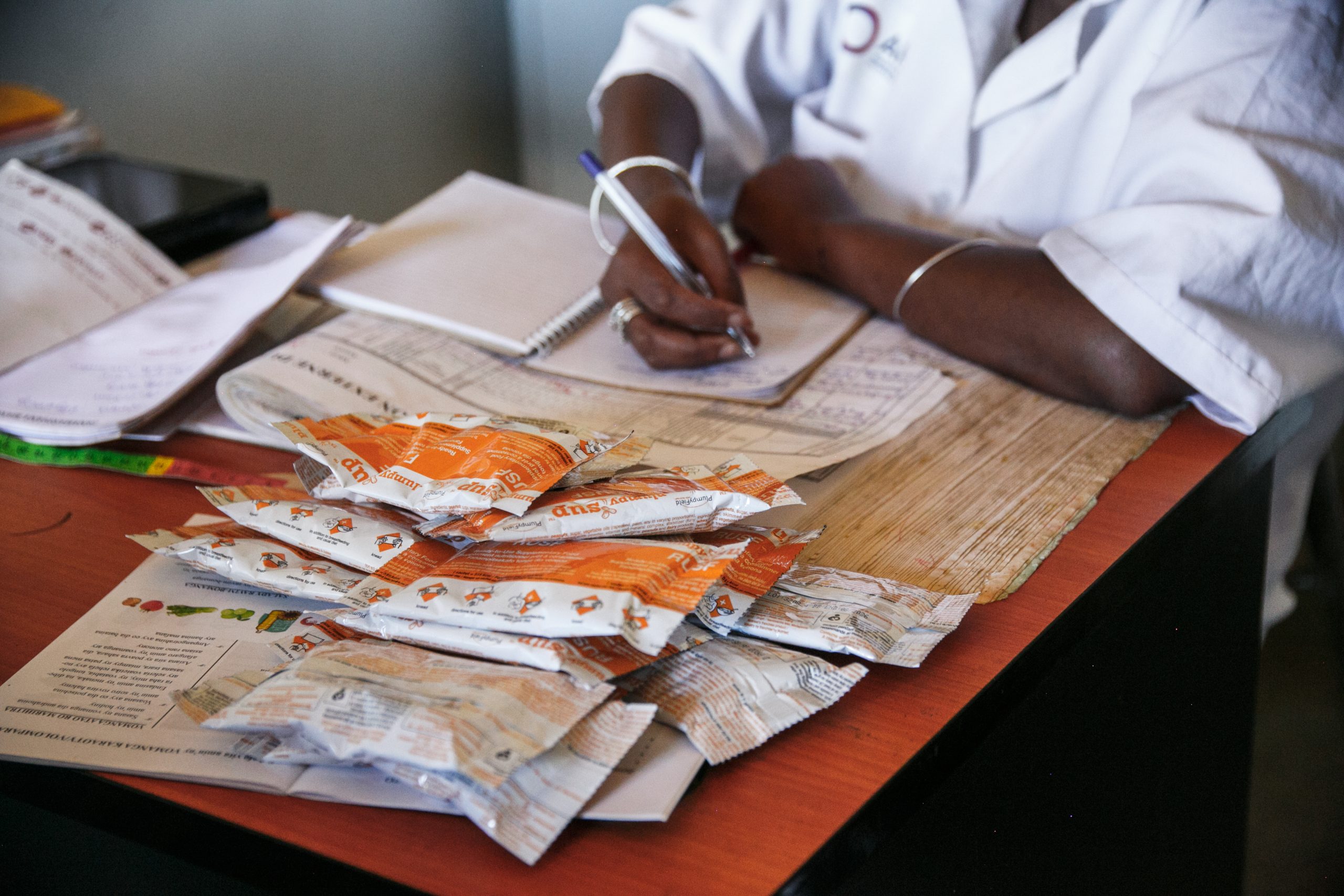 Mihaja Nantsoina Nomena Fitiavana Raharinjato checking the medicines stock.